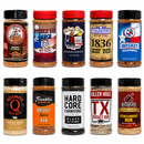Ten bottles from the DDR BBQ Supply Top 10 Store-Bought BBQ Brisket Rubs Variety Pack are arranged in two rows against a white background, each bottle showcasing a colorful and unique label—perfect for barbecue enthusiasts seeking variety.