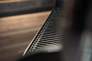 Close-up of a Pimp My Grill® Bodyguard Stainless Steel Grease & Paint Protector installed inside a Traeger Pro 34 / Century 885 / Texas pellet grill.