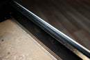 Pimp My Grill® Bodyguard Stainless Steel Grease & Paint Protector installed along the interior edge of a Traeger pellet grill.