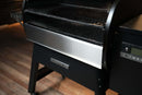 Pimp My Grill Bodyguard stainless steel grease shield installed on the front edge of a Ridgeline XL pellet grill.