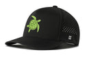 The Haka Hat Turtle Performance 5-Panel Hat by Haka Hat is a black Flexfit Snapback featuring a green turtle design on the front, small perforated holes on the side panel for breathability, water repellent fabric, and a comfortable Flexfit sweatband for all-day wear.