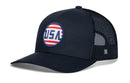 Introducing the Haka Hat USA Stripes Trucker Hat—a black America snapback featuring a breathable mesh back and a round, red, white, and blue embroidered patch with mirrored USA text on the front. This trucker hat by Haka Hat perfectly combines classic style with patriotic flair.
