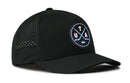 The Haka Hat Utah Hockey Performance 5-Panel Hat | UTA X Flexfit Snapback is a black baseball cap featuring a perforated side panel and a round front logo with crossed hockey sticks, a puck, and the letters U, T, and A outlined in light blue. This Haka Hat offers all-day comfort with its Flexfit sweatband.