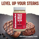 Jar of Japanese A5 Wagyu beef tallow with rich golden texture, ideal for briskets and gourmet grilling