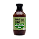 A bottle of WarPig BBQ FUBAR Elite BBQ Sauce featuring a green label, black cap, and the phrase “For use on butts and ribs.” The packaging showcases a pig graphic, highlights its veteran-owned status, and promotes its recognition as an award-winning BBQ sauce.