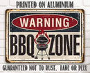 Vintage-style metal sign with 'Warning BBQ Zone' text and graphic on a white brick wall background.