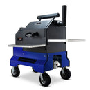 The Yoder Smokers YS480S Competition Pellet Grill by Yoder Smokers features a modern blue and black design, four wheels, side wire shelves, chimney, and top handle—ideal for direct-flame grilling and shown on a white background.