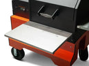 Close-up of a Yoder Smokers YS640 Stainless Steel Front Shelf Sleeve, showing its spacious BBQ prep area on the outdoor grill with a metal handle, control panel, sturdy wheels, and premium Yoder Smokers design.