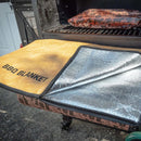 Drip EZ BBQ Meat Resting Blanket – Insulated Blanket for Brisket, Ribs, and Pork shown open with insulation pictured