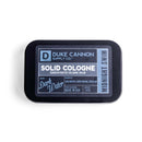 Duke Cannon Midnight Swim Solid Cologne with cold water and crisp green scent at DDR BBQ Supply